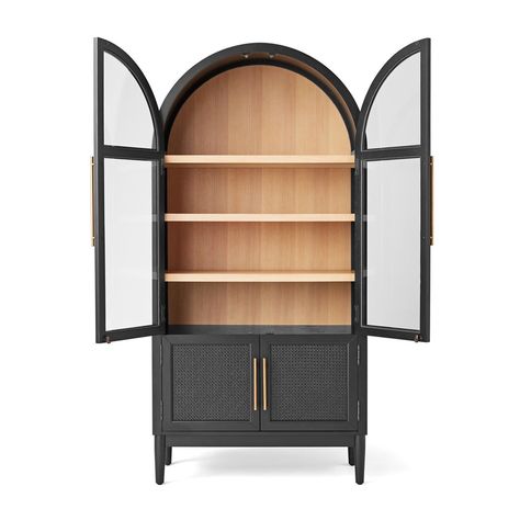 The Member’s Mark™ Enzo Bookcase Storage Cabinet is a stylish option for displaying your favorite books and keepsakes. The rich black finish paired with the pop of golden brown shelves brings mid-century modern charm to any room in your home. The combination of the two Sherwin Williams finishes creates a balanced, but obvious contrast to give it a defining character. The tall, curved silhouette creates additional space for storage and display. Th Curved Black Cabinet, Arched Storage Cabinet, Enzo Bookcase, Romantic Houses, Rattan Cabinet Doors, Bathroom Cabinets Ideas, Black Storage Cabinet, Storage Solutions For Small Spaces, Cabinets For Living Room