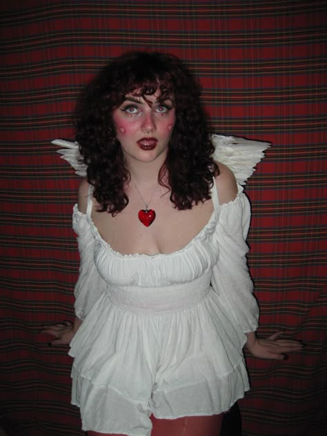 photo by @mymiscmedia on ig 90s inspired angel halloween costume princess polly romper cupid photoshoot 90s Fashion Halloween Costumes, Plus Size Cupid Costume, Cupid Halloween Costume Aesthetic, Cupid Aesthetic Costume, Vintage Cupid Costume, Cute Cupid Halloween Costume, Cupid Outfit Costumes, Cupid Female Costume, Female Cupid Costume