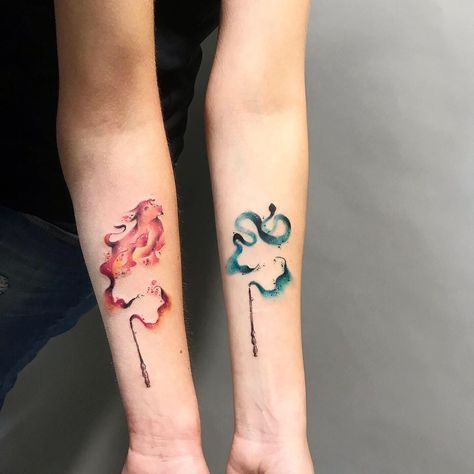 Harry Potter tattoo inspo from @gabi.cuni.tattoo. Click the link for more tattoos inspired by the Wizarding World ✨  #harrypotter #harrypottertattoo #tattooinspiration #tattoos #tattoo #watercolortattoo #hogwarts #hogwartstattoo #forearmtattoo #matchingtattoo #friendshiptattoo #colortattoo #Patronus #Patronustattoo Matching Harry Potter Tattoos, Hufflepuff Tattoo, Expecto Patronum Tattoo, Patronus Tattoo, Patronus Harry Potter, Slytherin Tattoo, Harry Potter Tattoo Sleeve, Hogwarts Tattoo, Fandom Tattoos