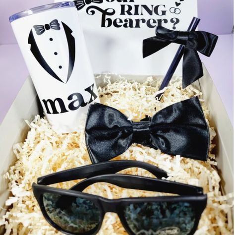 Prepare for the most adorable ring security officers at your wedding with our Ring Bearer Proposal Boxes! 🕶️💍 Tag a 2024 bride to be 👰‍♀️ . . . . @theknot @atlantaweddingextravaganza @weddingwire @weddingfavorites #bride2be #monochrome #ringbearer #ringsecurity #mrstobe #newlyengaged #2024bride #weddingfavors #bridalparty #teambride #weddingideas #shopsmall #weddinginspo #customtumbler #customgifts #weddingluxe #2024wedding #giftsforhim #newbride #monochromestyle Ring Bearer Gift Ideas, Ring Bearer Security, Blush Wedding Theme, Ring Bearer Proposal, Purple Flower Girls, Ring Bearer Gift, Groomsmen Proposal Gifts, Flower Girl Proposal, Ring Security