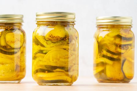 These easy squash pickles are the perfect way to use all of that abundance of zucchini or summer squash. Use this recipe to extend the season. Squash Pickles, Tomato Pickle Recipe, Pickled Eggplant, Pickled Watermelon Rind, Pickled Foods, Sour Pickles, Lime Pickles, Pickles Recipe, Water Bath Canning