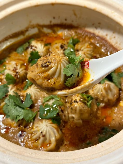 Spicy Sesame Soup Dumplings | Cabagges.World Soup Dumpling Sauce Recipe, Spicy Soup Dumplings, Spicy Dumpling Soup, Dumpling Tacos, Sesame Dumplings, Chinese Dumpling Soup, Dumplings Aesthetic, Spicy Dumplings, Pork Soup Dumplings