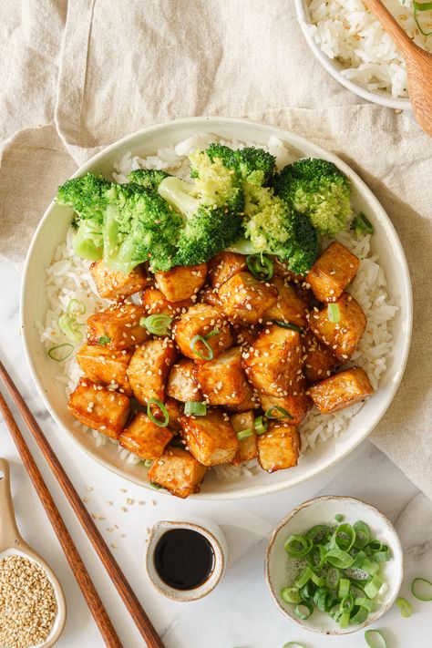 A bowl of rice topped with crispy teriyaki tofu and broccoli. Teriyaki Broccoli, Tofu And Rice, Tofu Rice Bowl, Tofu Broccoli, Tofu And Broccoli, Crispy Tofu And Broccoli, Teriyaki Tofu And Broccoli, Tofu Broccoli Bowl, Tofu Brocolli Recipe