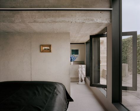 Pieter Mulier resides in a Brutalist belvedere in Antwerp | THE WORLD OF INTERIORS Concrete Villa, Brutalist Furniture, Brutalist Interior, The World Of Interiors, Concrete Bench, Tower Block, Timeless Interiors, Concrete Home, Unique Interior Design