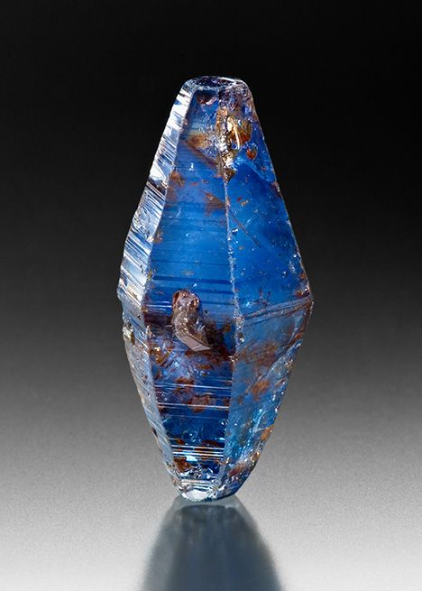 Figure 7. Rough bipyramidal sapphire crystal from Sri Lanka, weighing 10.4 grams (51.70 ct). Photo by Robert Weldon/GIA; courtesy of William Larson, Pala International. Raw Sapphire Crystal, Raw Sapphire, Minerals Crystals Rocks, Magic Items, Crystal Aesthetic, Rock Steady, Beautiful Crystals, Jewelry Education, Quartz Geode