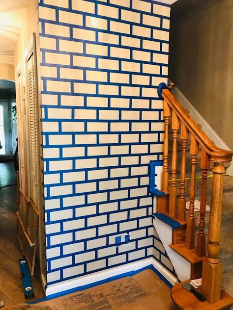 Painting A Faux Brick Wall, Paint Faux Brick Backsplash Kitchen, Diy Faux Brick Backsplash, Diy Brick Accent Wall, Faux Brick Bedroom, Taped Wall Designs Painters, Diy Brick Wall Painting, Painted Brick Accent Wall, Wall Tape Designs