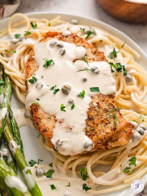 Heavy cream, white wine, lemon juice, and capers give this Chicken with Caper Cream Sauce recipe a bright, tangy, and briny flavor. Ready in just 25 minutes, this simple yet elegant dish is perfect for both busy weeknights with the family and special occasions with friends! Heavy Cream Sauce, Caper Cream Sauce, Cream Sauce Recipe, Cream Sauce Recipes, Cream Sauce, Sauce Recipe, Heavy Cream, Lemon Juice, Cream White