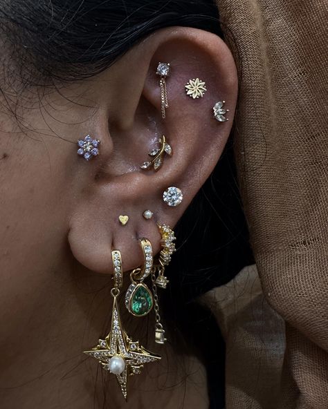 Adding more bling to this ear curation 🌟  Faux rook + stacks by @piercernomercy_  Soho, Union Square, and Williamsburg  11AM-9PM 7 DAYS A/W🕘 WALK-INZ OR BOOK ONLINE..📕 TATTOOS & PIERCINGS, NO ATTITUDE, NO MISERABLE HOOPS TO JUMP THROUGH....🚫  WALK-INZ WELCOME OR BOOK ONLINE AT  ⚔️livebytheswordtattoo.com⚔️ . . . . #fauxrook #stacks #earpiercing #earcuration #soho #manhattan Cluttered Ear Piercings, October Jewelry, Soho Manhattan, Ear Curation, Ear Peircings, Men's Piercings, Cool Ear Piercings, Pretty Ear Piercings, Cool Piercings