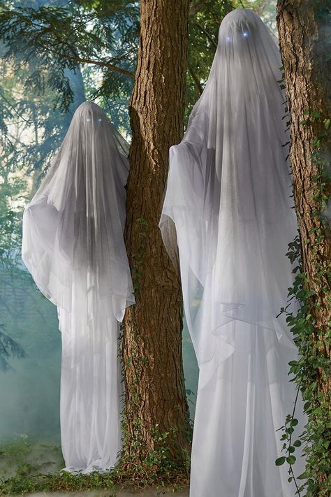 These massive and quite terrifying ghostly figures have sinister white glowing eyes, posable arms, and can be height adjusted up to 8 feet tall. Yard Witch, Engagement Party Decorations Diy, Halloween Tombstones, Engagement Party Decorations, Grandin Road, Halloween Yard, Very Scary, Light Eyes, Halloween Props