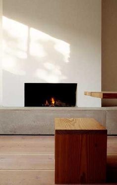 Pawson House @ London 1992 – 1994, by John Pawson. This picture has two  candlesticks on the table! | John Pawson's house in London. | Pinterest |  Modern firep… Minimalist Fireplace, John Pawson, White Fireplace, Home Fireplace, Modern Fireplace, Interior Architect, Fireplace Wall, Living Room With Fireplace, Fireplace Design