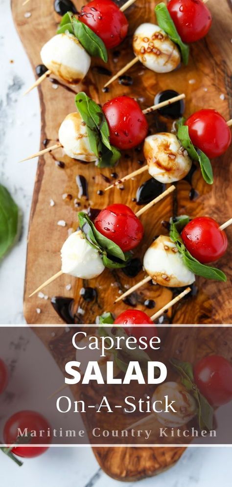 This easy recipe for Caprese skewers features all of the flavor of Caprese salad - but on a stick!Featuring juicy cherry tomatoes, creamy mozzarella balls, and aromatic basil, this fun appetizer is both fancy and flavorful. Caprice Salad Tomato Mozzarella Caprese Skewers, Charcuterie Board Caprese, Mozerella Tomato Skewers, Classy Wedding Appetizers, Tomato Basil And Mozzarella Appetizers, Caprese On A Stick, Cherry Tomatoes Appetizers, Recipes With Fresh Mozzarella Balls, Stuffed Tomatoes Appetizer