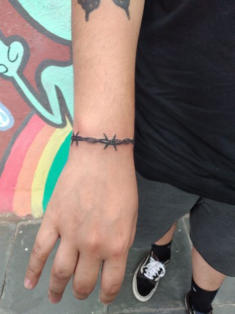 Barbed Wire Arm Tattoo Women, Barbed Wire Tattoo Around Wrist, Barbwire Band Tattoo, Barb Wire Bracelet Tattoo, Barb Wire Around Wrist Tattoo, Tattoo Ideas For Men Barb Wire, Barbwire Bracelet Tattoo, Wrist Barbed Wire Tattoo, Barbwire Wrap Around Tattoo