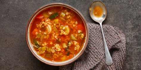 Bowl of tomato and winter vegetable soup, with a spoon Winter Soup Recipes, Winter Vegetable Soup, Broccoli Pasta Bake, Lemon Spaghetti, Winter Vegetable, Hungarian Cuisine, Winter Soup Recipe, Winter Soup, Food Soup