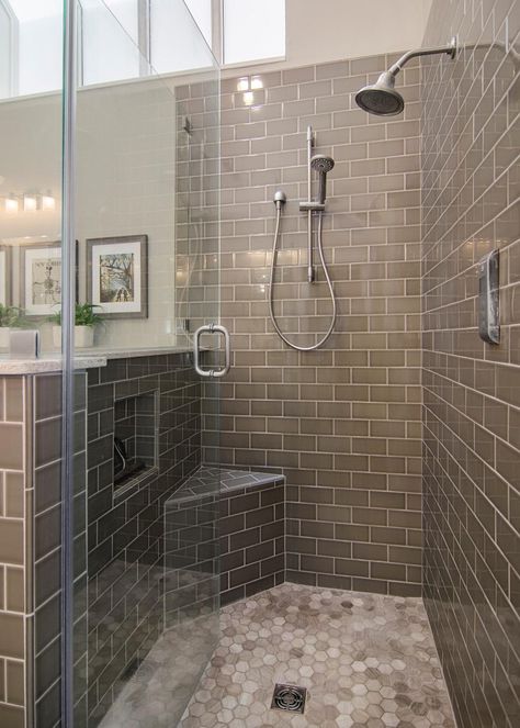 Use differently shaped and textured tiles in a shower to create a eye-catching geographic display, as seen here with the backsplash and mosaic tile floor. But keep the color palette similar to avoid making the space too busy. Trendy Bathroom Tiles, Budget Bathroom Remodel, Master Shower, Murphy Beds, Bathroom Shower Tile, Bathroom Remodel Shower, Main Bathroom, Bathroom Floor Tiles, Shower Remodel