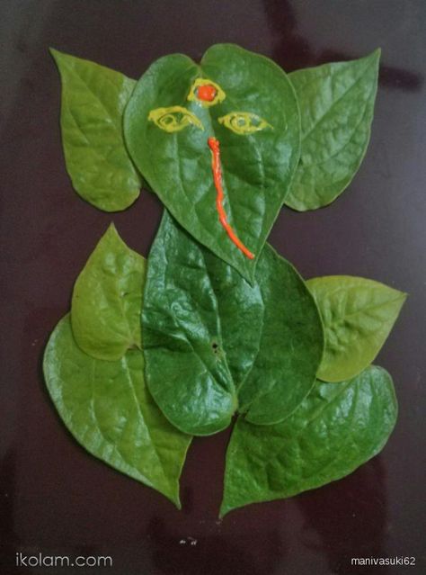 Rangoli Leaf ganesha beetle leaves | www.iKolam.com Leaf Ganesha, Wedding Ideas Simple, Trendy Wedding Ideas, Ganesh Chaturthi Decoration, Thali Decoration Ideas, Rangoli Simple, Ganapati Decoration, Diwali Decorations At Home, Diy Diwali Decorations