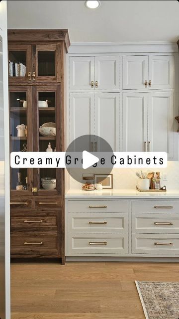 Aimee Lee Minnick on Instagram: "Our most asked question during the parade was, "What color are the painted caninets?"

We chose the most amazing custom greige finish. When paired with the warmth of the walnut, it made for the coziest, most timeless transitional kitchen. Problem was, it was a custom color and we had no idea what the formula was (the cabinet maker keeps their finishes under lock and key!) 

I had brought my paint fan in and compared it to SW's Accessible Beige, which was a very close match. But did you see that video?!

Turns out, World Gray hits the nail on the head!

You're welcome.

Creamy painted cabinets off white cabinet color custom modern transitional kitchen walnut cabinets white countertops white walls herringbone backsplash walnut kitchen custom kitchen design id Timeless White Kitchen Cabinets, Greige And Wood Kitchen, Sw Naturel Cabinets, Kitchen Walnut And White, Frameless Cabinets Kitchen, Walnut Cabinets White Countertops, Kitchen Walnut Cabinets, Walnut Cabinets Kitchen, Modern Transitional Kitchen