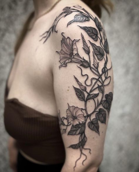 Ivy With Flowers Tattoo, Vines With Words Tattoo, Cottage Core Aesthetic Tattoo, Goth Garden Tattoo, Feminine Shoulder Cap Tattoo, Botanical Shin Tattoo, Shoulder Foliage Tattoo, Gothic Garden Tattoo, Corpse Flower Tattoo