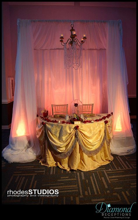 Beauty and the Beast inspired sweetheart table.  www.diamondreceptions.com Beauty And The Beast Wedding Table, Elegant Beauty And The Beast Wedding, Beauty And The Beast Sweetheart Table, Beauty And The Beast Ceremony Decor, Beauty And The Beast Main Table Decor, Beauty And The Beast Wedding Decorations Wedding Table Decor, Beauty And The Beast Seating Chart, Beauty And The Beast Table, Beauty And The Beast Sign In Table