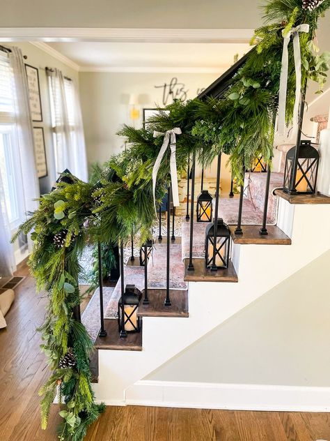 Real Garland On Staircase, Garland And Stockings On Staircase, Cedar Garland Staircase, Christmas Garland On Stairs Railings, Hanging Garland On Stairs, Christmas Decor Stairs Railings, Greenery On Staircase, Garland For Stairs Railings, Railing Garland Christmas