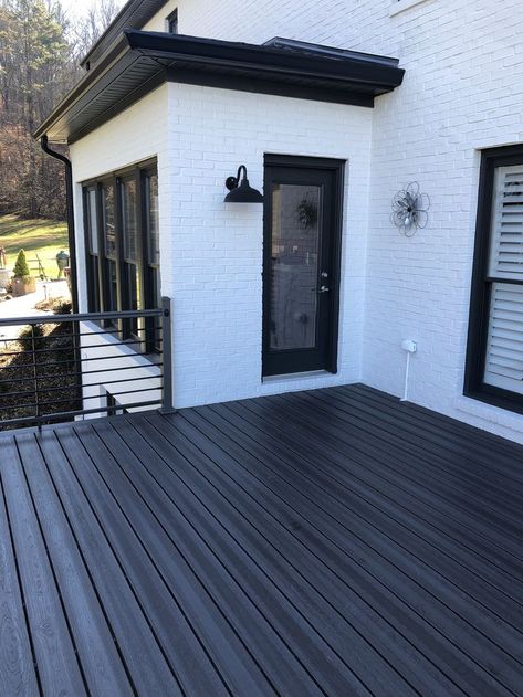 Black Deck Ideas Outdoor Living, Update Deck Railing, Painted Composite Decking, Dark Composite Decking, Black Back Deck, Modern Composite Deck, Black Deck White House, Modern Farmhouse Railing Exterior, Black Trex Deck