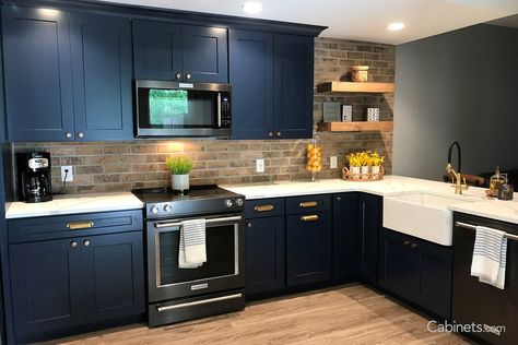 Shaker Navy Blue L =Shaped Kitchen with Gold Hardware - Cabinets.com Navy Kitchen Black Appliances, Navy Blue Kitchen Cabinets Farmhouse, Kitchen With Gold Hardware, Kitchen Cabinets With Black Appliances, Blue Kitchen Appliances, Navy Kitchen Cabinets, Blue Shaker Cabinets, Gold Kitchen Hardware, Navy Blue Kitchen Cabinets