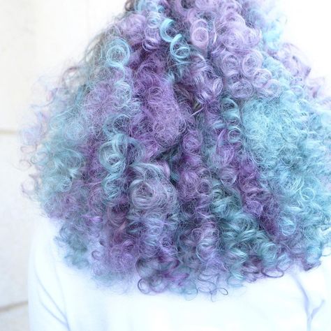 Purple blue curly dyed hair Pastel Blue Purple Hair, Periwinkle Curly Hair, Pastel Purple Curly Hair, Blue And Purple Curly Hair, Light Blue Hair Curly, Lavender Afro, Pastel Curly Hair, Light Blue Curly Hair, Lavender Curly Hair