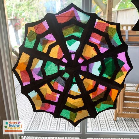 Spider Web Suncatcher Craft for Kids - Happy Toddler Playtime Spider Web Suncatcher, Spiderweb Suncatcher, Spider Suncatcher, Halloween Suncatchers, Easy Halloween Crafts For Kids, Stained Glass Spider Web, Spider Web Craft, Stained Glass Spider, Halloween Crafts Preschool