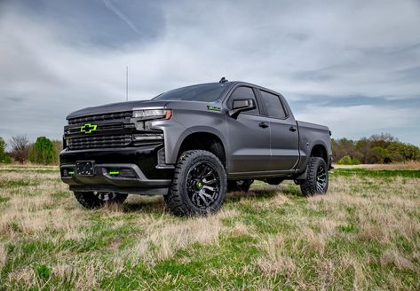 Custom matte grey metallic wrapped lifted Silverado with lime green Grey Chevy Silverado, Camo Wrapped Trucks, Chevy Accessories, 2020 Silverado 2500 Hd Lifted, 2014 Chevy Silverado Lifted White, Custom Silverado, Lifted Silverado, Blacked Out Lifted Chevy Silverado, Chevy 1500