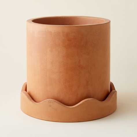 Featuring playful squiggles, the Rosemead Pot is made from cement with a terracotta hue and is perfect for both indoor and outdoor use. The saucer has a unique squiggle-edged rim and the pot has a drainage hole. Shipping:Ships in 1-3 weeks Dimensions: Small: 12" x 10.75" Large: 16.25" x 15" Plant Ceramic Pots, Thrown Pottery Ideas, Fun Ceramics, Pottery Pinch Pot, Planter Pottery, Clay Plant Pots, Pots Ceramic, Coil Pottery, Handmade Ceramic Planters