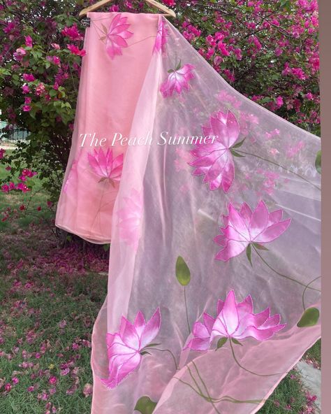 Handpainted Lotus Saree ____________________________ A symphony of handpainted and hand-embroidered pinkish white lotuses gracing pure silk organza. Every thread tells a story of artistry and timeless beauty. Shop from us for exclusive pieces that speak to your soul. . . . . . Shop now @thepeachsummer . . . . . . #sareelove #handcraftedfashion #pureelegance #thepeachsummer #thepeachsummercollection #shopnow #lotus #handpainted #handembroidered #celebrity #celebritystyle #réel #reels #reel... Organza Saree Painting Ideas, Lotus Saree, Saree Painting, Fashion Technology, Hand Painted Dress, Painted Fabric, Dress Painting, Set Saree, Hand Painted Fabric