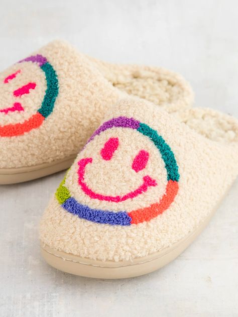 It's the little things that make life more fun...like these super cute and cozy sherpa-lined slippers! Made with the softest boucle and a sturdy rubber sole, they're perfect for walking your dog, grabbing a quick coffee, or spending the day lounging at home! These neon smiley face-printed slip-ons add a pop of color an Women’s Slippers, Cute House Shoes, Preppy Slippers, Neon Smiley Face, Sherpa Slippers, Boho Socks, Smiley Face Slippers, Rolling Tote Bag, Slipper Shoes Women