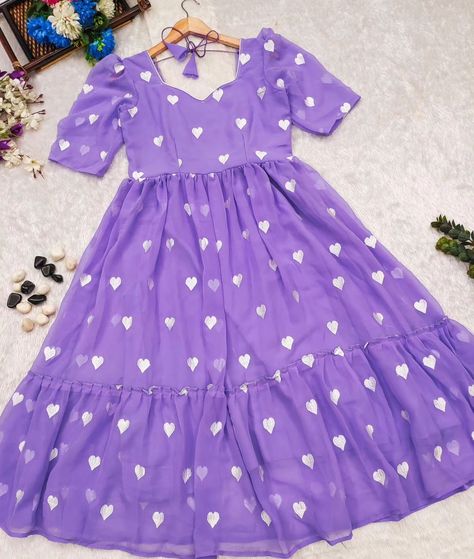 *PRICE :-899/-+shipping 1275 LAVENDER HEART 💜 Here's presenting you a perfect pretty fit for Party Wear The beautiful heart ❤️ All Over the Midi😍 Along With Complimenting neck line just makes its more beautiful 🤍❤️ Details ✓Material :- Georgette ✓Gown Length :- 48 ✓Sleeves Length :- 12" ✓Neckline Sweetheart MAXI SIZE :- M-38 L-40 XL-42 XXL-44 * Happy Shopping ❤️🛒 *YOU DESIRE ❤️ WE DELIVER 🎁* Simple Frock, Simple Frock Design, Lace Suit, Georgette Gown, Simple Frocks, Lavender Heart, Gold Bridal Jewellery, Gold Bridal Jewellery Sets, Baby Frocks Designs