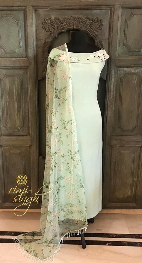 "The biggest source of motivation are your own thoughts , so think big and motivate yourself to win."  Pista green off-shoulder crepe kurta with hand embroidery on the neckline paired with matching cotton lycra pants and a silk organza dupatta with floral motifs.  Available exclusively at  Rimi Singh Studio A 999 Sushant Lok 1  Gurgaon  #9818310054. Pista Green, Churidar Designs, Salwar Dress, Salwar Designs, Long Kurti Designs, Pakistani Dresses Casual, Salwar Kamiz, Dress Neck Designs, Trendy Dress Outfits