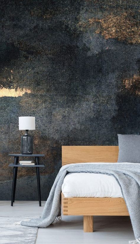 Take the popular dark interior trend to the next level with an Elizabeth Fredrikson mural. Featuring dark tones for a sultry and modern vibe, paired with golden accents for a touch of luxury, this beautiful mural is the ultimate dark feature wall for your bedroom. Place behind your bed and style with lighter soft accessories to brighten up the room. #bedroominspo #bedroomdesign #darkinteriors Accent Wall Behind Bed Wallpaper, Wallpaper Bedrooms Dark, Dark Wallpaper Bedroom Design, Dark Wallpaper For Bedroom, Dark Wallpaper Bedroom Accent Wall, Dark Grey Wallpaper For Bedroom, Dark Feature Wall, Wallpaper Behind Bed, Dark Grey Brick Wallpaper Bedroom