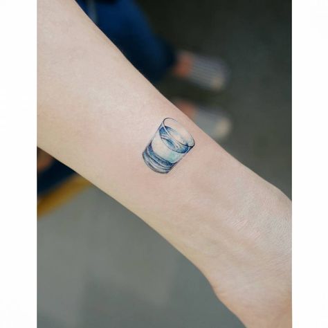 A realistic and small glass of water tattoo Glass Of Water Tattoo, Beer Tattoos, Simple Tattoos For Women, Cup Tattoo, Inner Forearm Tattoo, Full Tattoo, Water Tattoo, Skeleton Tattoos, Original Tattoos