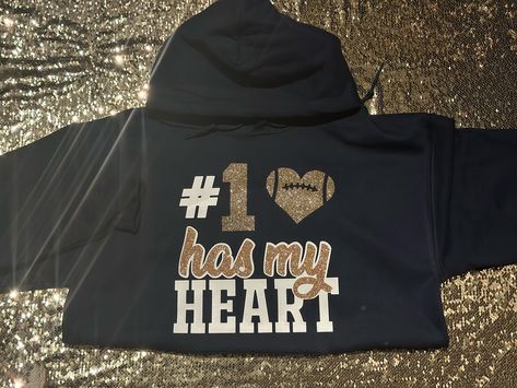 #1 has my heart 🖤🫶🏾Custom Football Hoodie! 🏈 DM or TEXT (313)318-0114 to place an order📲| #jaicreativecollection🎀 #footballseason #basketball #basketballseason #custombasketball #custombasketballhoodie #basketballgirlfriend #detroitsmallbusiness #customhoodie #customphotohoodie #proudbasketballgirlfriend #supportdetroitblackbusinesses #southfieldbusiness #smalldetroitbusinesses #proudgirlfriend Basketball Shirts For Best Friends, Football Shirts For Best Friends, Basketball Girlfriend Hoodies, Basketball Hoodies For Girlfriends, Girlfriend Basketball Shirts Ideas, Custom Basketball Shirts Girlfriend, Basketball Shirts For Girlfriends, Basketball Girlfriend Shirts Ideas, Basketball Girlfriend Shirts