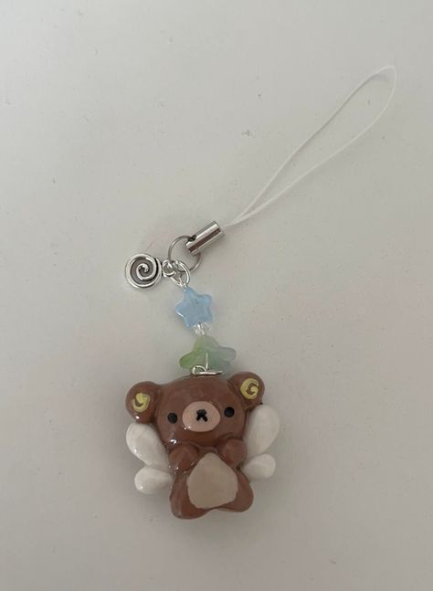 Handmade polymer clay bear keychain crafted with love and glazed with UV Resin to last <3 Keychains come with extra special customization with hand-picked beads and charms attached to make the keychain pop!   ☆ NOTE ☆ These are made with the most care and attention to detail, however are not indestructible. I carefully craft these to ensure they are protected and not easy to break. Please remember that these are handmade so avoid using them harshly or with a lot of pressure to further protect th