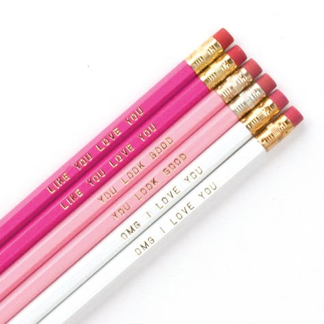 Our assorted pencil set has 2 each of 3 different pencil styles: You Look Good, Like You Love You, and OMG I Love You. DETAILS- wood #2 hexagon pencil- pink & white barrels, gold ferrule, and red eraser- gold foil imprints- unsharpened- set of 6 pencils- Packaged in cellophane- Printed in the USA© Graphic Anthology. All rights reserved.Like these pencils? Share them and follow us on Instagram or Pinterest!* Can be shipped plastic-free by request at checkout. Preppy Pencils, Cute School Supplies Pens & Pencils, Cute Stationary Pens & Pencils, Pencil Aesthetic, Pencils For School, Cute Pink Pencil-shaped Pencil Case, Pink Mechanical Pencils, Cute Pencils, Middle School Supplies