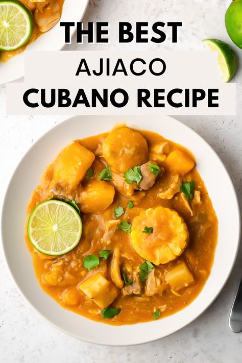 An overhead shot of a white bowl full of hearty cuban country-style stew with the words "the best ajiaco cubano recipe" in the foreground Cuban Ajiaco Soup, Spanish Soup Recipes Puerto Rico, Malanga Recipes Puerto Rico, Cuban Chicharo Recipe, Cuban Thanksgiving Recipes, Ajiaco Cubano Recipes, Cuban Soup Recipes, Cuban Pasta, Ajiaco Soup