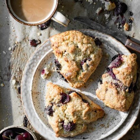 Homemade Cherry Scones Recipe is the perfect breakfast treat for cherry season. Large easy scones flavored with fresh cherries, orange, vanilla, and almond. #cherryscones #cherryrecipes #sconesrecipe #cherrysconesrecipe #twocupsflour Cherry Scones Recipe, Berry Scones, Cherry Scones, Blueberry Biscuits, How To Make Scones, Chocolate Blueberry, Inside Cake, Chocolate Scones, Blueberry Scones