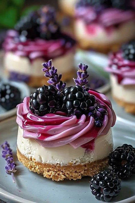 Cheesecake Recipes Blackberry, Mini Blackberry Lavender Cheesecakes, Blackberry Lavender Cheesecake, Blackberry Cheesecake Recipes, Pretty Cheesecake, Lavender Desserts, Blackberry Desserts, Blackberry Dessert Recipes, Lavender Cheesecake