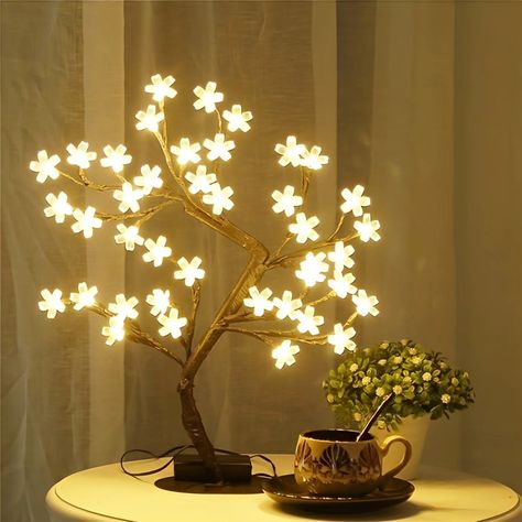 Light up your space with the enchanting glow of this Cherry Blossom Tree Lamp! 🌸✨ Perfect for adding a touch of elegance to any room. Dm us for more information 🤠 #new #newpost #lamp #elegance #artwork #homedecor #brightenup #ordernow #trending #flowerart #cherryblossom #natureinspired #truebeauty #artcollection #treelamp #fashiontrends #decorativeitems #shopnow #instastore #limitededition #followformore #likesforlike #followme #sanskritiartsindia Cherry Blossom Bonsai Tree, Led Art, Black Nightstand, Tree Lamp, Tree Table, Nightstand Lamp, Tree Lights, Night Table, Blossom Tree