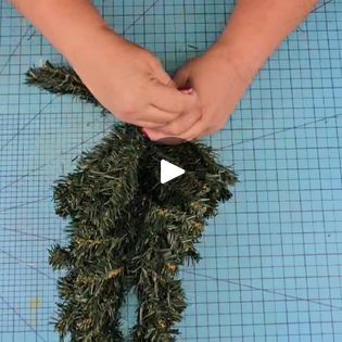 10K views · 394 reactions | Use A Dollar Tree $1.25 Christmas Tree For This Front Door HACK! | Use A Dollar Tree $1.25 Christmas Tree For This Front Door HACK! | By DIY Beauty On Purpose | For this next Dollar Tree DIY
craft, we are going to take another one of the green trees,
actually two of them. We're going to remove the base and
then we are going to join both of these together. First, we're
going to fluff em up just a little bit and then we're
going to bring all the bristles to one side because we want to
join em side to side. I have also joined them top of each
other and they look great but for this project, we're
going to just line em up right next to each other and using
black zip types from Dollar Tree. We are going to tie I
used three of them. And then we're going to fluff it jus Christmas Door Decoration, Dollar Tree Hacks, Dollar Store Christmas, Dollar Tree Christmas, Cottage Christmas, Green Tone, Christmas Tree Wreath, Dollar Tree Diy Crafts, Christmas Projects Diy