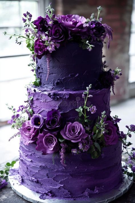 An elegant and sophisticated three-tiered wedding cake decorated with fresh flowers in shades of purple and pink stock images Shades Of Purple Cake, Wedding Cake Purple, Royal Purple Wedding, Dark Carnival, Cake Purple, Purple Wedding Cake, Purple And Green Wedding, Purple Wedding Cakes, Carnival Wedding