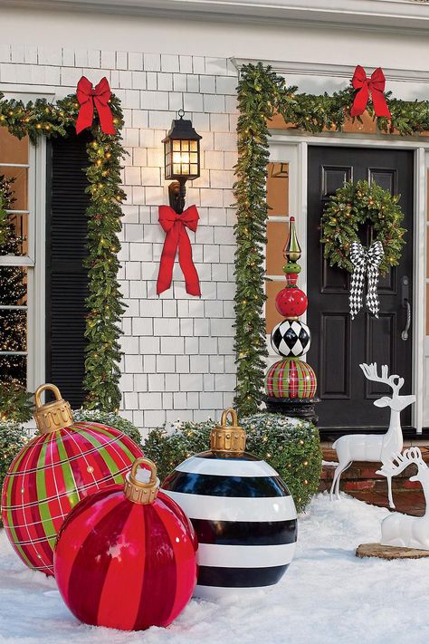 These Oversized Christmas Ornaments Are So Much Better Than Your Neighbor’s Giant Inflatablescountryliving Christmas Decorations Outside, Large Outdoor Christmas Ornaments, Large Christmas Ornaments, Outside Christmas Decorations, Front Door Christmas Decorations, Grinch Christmas Decorations, Christmas Tablescape, Christmas Decorations Diy Outdoor, White Christmas Decor