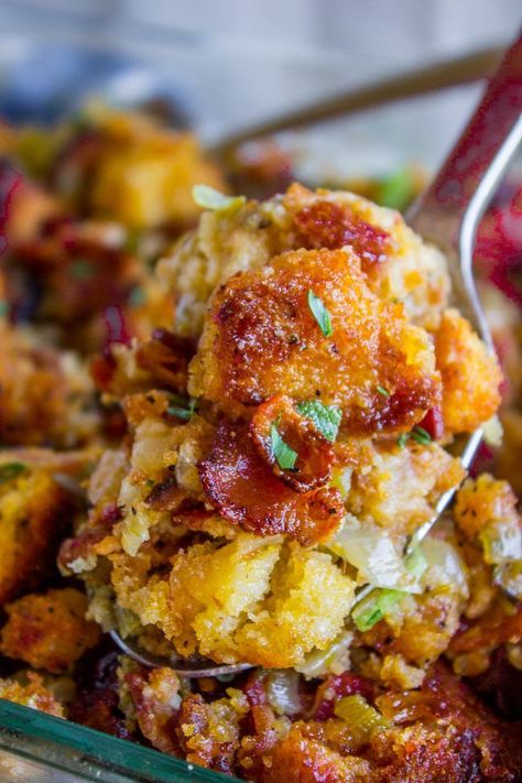 Cornbread Stuffing with Bacon and Sage from The Food Charlatan. Stuffing is never boring when there is bacon involved! This Cornbread Stuffing recipe has tons of bacon as well as sage and thyme to get those classic Thanksgiving aromas going on. The perfect side dish to go with turkey and gravy! #thanksgiving #stuffing #cornbread #bacon #celery #casserole #sidedish #easy #recipe #homemade #best #traditional #sage #thyme Thanksgiving Stuffing Cornbread, Celery Casserole, Stuffing With Bacon, Stuffing Cornbread, Gravy Thanksgiving, Turkey And Gravy, Cornbread Stuffing Recipes, Cornbread Stuffing, Thanksgiving Food Sides