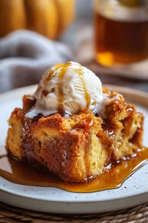 Pumpkin bread pudding might just be the ultimate fall dessert, thanks to the creamy pumpkin custard, tender brioche, and luscious caramel drizzle. Ramekin Bread Pudding, Bread Pudding Pumpkin, Thanksgiving Bread Pudding Recipes, Pumpkin Bread Pudding Easy, Pumpkin Brioche Bread, Maple Bread Pudding, Pumpkin Bread Pudding Recipe, Thanksgiving Bread Pudding, Butterscotch Bread Pudding