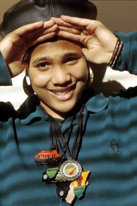 Monie Love began her career in the British Jus Bad crew, then later became a protege of Queen Latifah. Her debut album produced two Grammy-nominated hits, "Monie in the Middle" and "It's a Shame (My Sister)." Monie Love, Queen Ii Album Cover, Alanis Morissette Album Cover, Janelle Monae Album Cover, Queen News Of The World Album Cover, A Tribe Called Quest Album Covers, Queen Latifah, Grammy Nominations, Debut Album