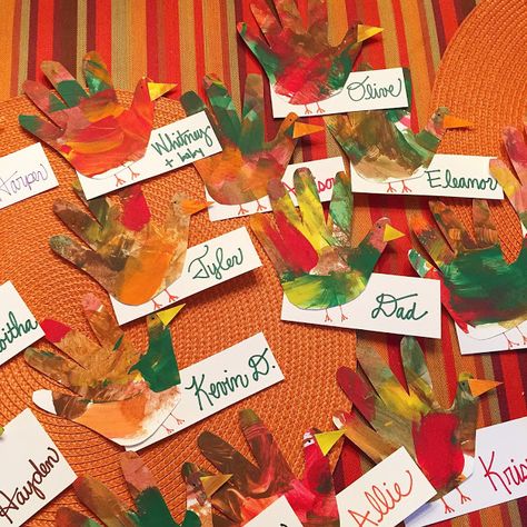 Child art hand print turkey place cards Diy Thanksgiving Place Cards Kids, Kid Made Thanksgiving Place Cards, Thanksgiving Table Name Cards Kids Diy, Thanksgiving Placecards Ideas For Kids, Thanksgiving Place Cards Kids Can Make, Kids Thanksgiving Place Cards, Thanksgiving Place Cards Diy Kids, Thanksgiving Name Place Cards Diy Kids, Hand Print Turkey