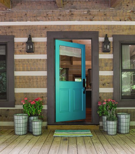 11 Bright Front Door Colors That Will Seriously Amp Up Your Curb Appeal Turquoise Doors On Houses, Turquoise Door Exterior, Scandi Exterior, Cabin Addition, Cabin Makeover, Bright Front Doors, Entry Door Colors, Teal Front Doors, Exterior Door Colors